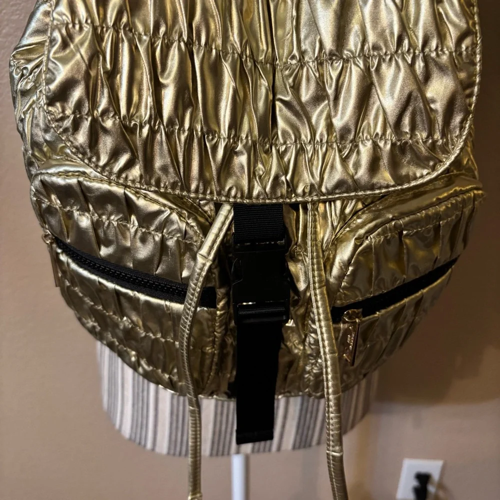 NWT Madden Girl Backpack Metallic Gold Quilted Drawstring Shiny Black Zip Straps